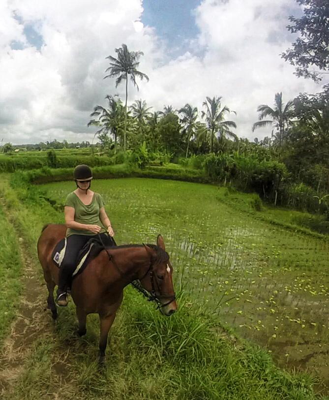 Sandra Kelly enjoying a ride through rice fields in Bali